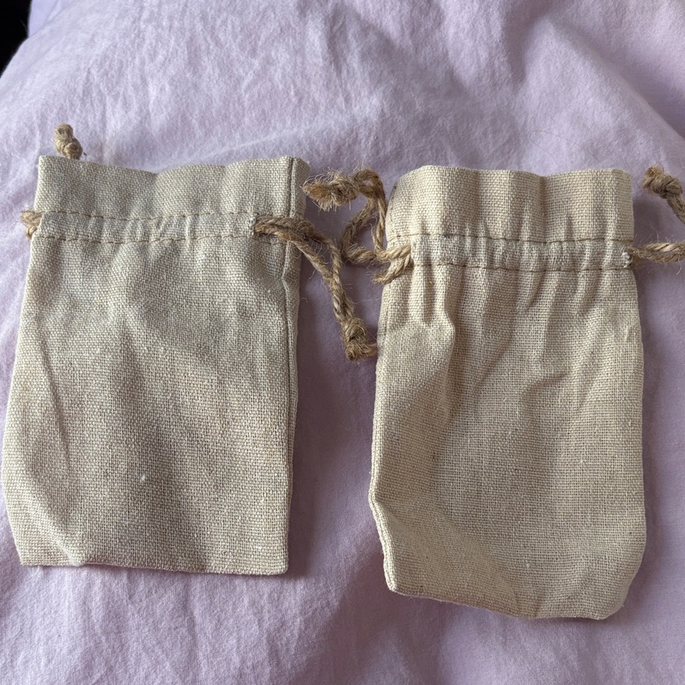 Set of 15 Beige Burlap Drawstring Pouches.